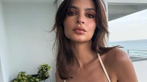 Emily Ratajkowski Stuns in Plunging Dress for Fragrance Shoot in Miami