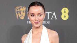 Phoebe Dynevor Stuns in Plunging Ivory Dress at BAFTA Film Awards 2024