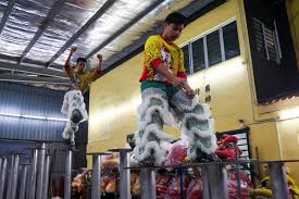 Unleashing the Power of Lion Dance: A Thrilling Display of Teamwork and Discipline