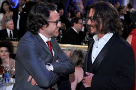 Johnny Depp’s Mistaken Photo with Robert Downey Jr. After Winning Academy Award