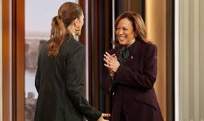 Kamala Harris Stuns in Polka Dot Blouse & Burgundy Suit on ‘Drew Barrymore’ Show