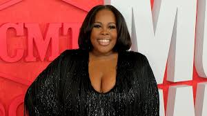 Amber Riley Stuns in Black Dress at CMT Music Awards 2024