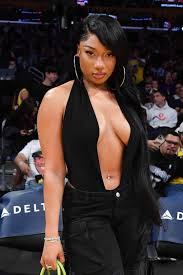 Megan Thee Stallion Shines Courtside with Neon Birkin Bag