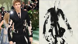 Eddie Redmayne and Wife Turn Heads in Bespoke Look at Met Gala 2021