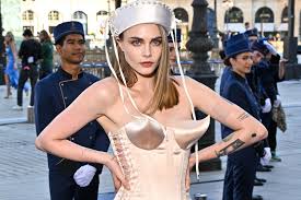 Cara Delevingne Stuns in Sailor Hat and Cone Bra Corset at Vogue World Paris