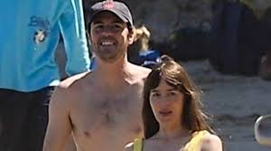 Dakota Johnson Stuns in Yellow Bikini During Fun Beach Day with Jeremy Allen White