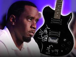 Exclusive: Diddy’s Rare Electric Guitar From Bad Boy Records Hits Auction Block