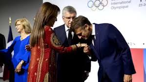 Nita Ambani Stuns in Red Suit at Paris 2024 Olympics Event with Emmanuel Macron