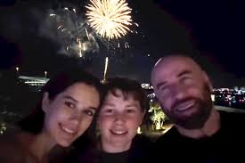 John Travolta Enjoys Fourth of July Celebration at Yankee Stadium with Family