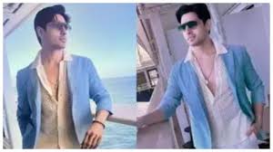 Sidharth Malhotra’s Stylish Summer Look: Elevate Your Wardrobe with Pastel Blue Blazer and Beige Mesh Shirt